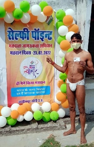 Unique protest: Voting arrived in only mask and nappy