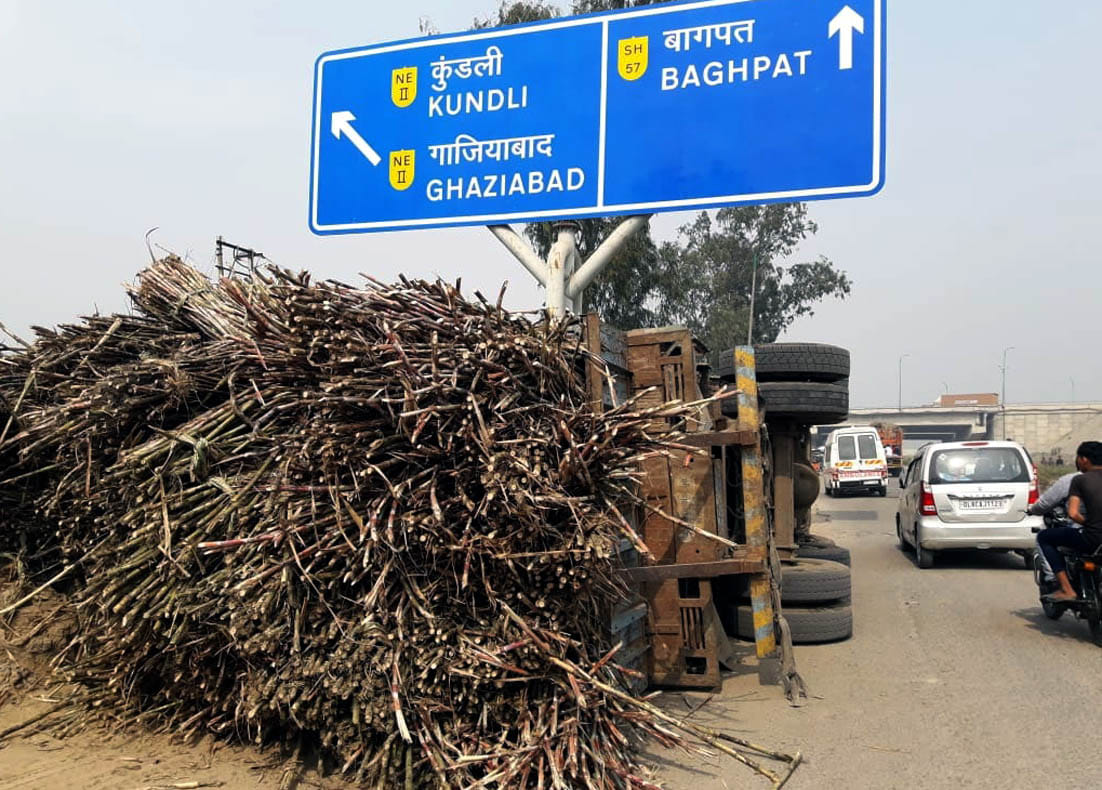 Truck loaded with sugarcane overturns on Delhi-Saharanpur highway
