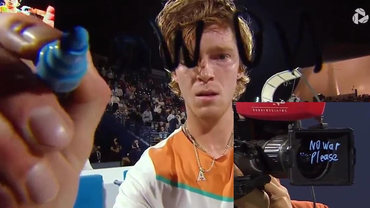 Russian tennis star Andrey Rublev signed No War please on the camera lens after finishing a match in Doha