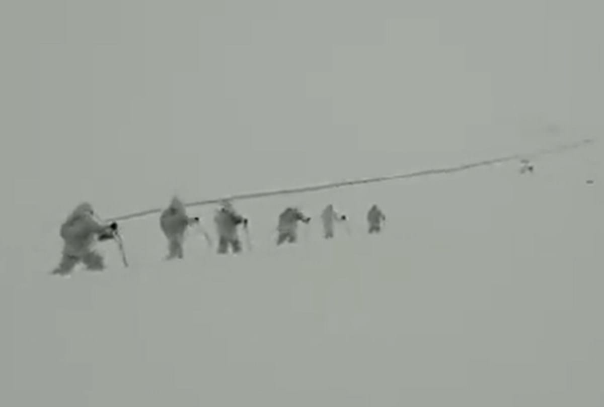 Indo-Tibetan Border Police patrolling amidst snowfall at an altitude of 14000 feet in Himachal Pradesh