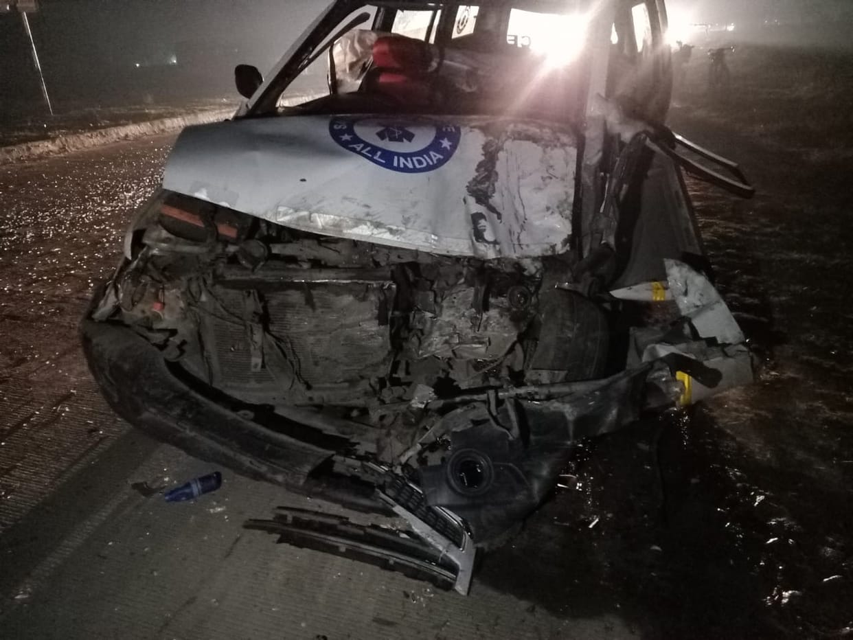 Ambulance carrying six dead bodies collided with private bus