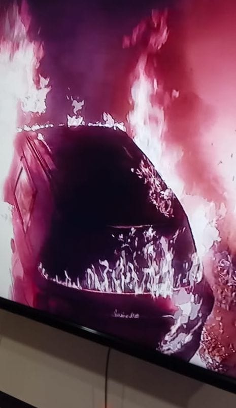 A car parked outside the house was set on fire by sprinkling petrol