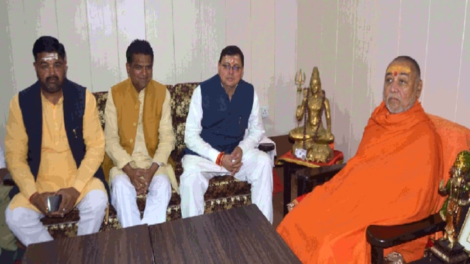 cm pushkar singh dhami claimed to form government again in uttarakhand took blessings from jagadguru shankaracharya
