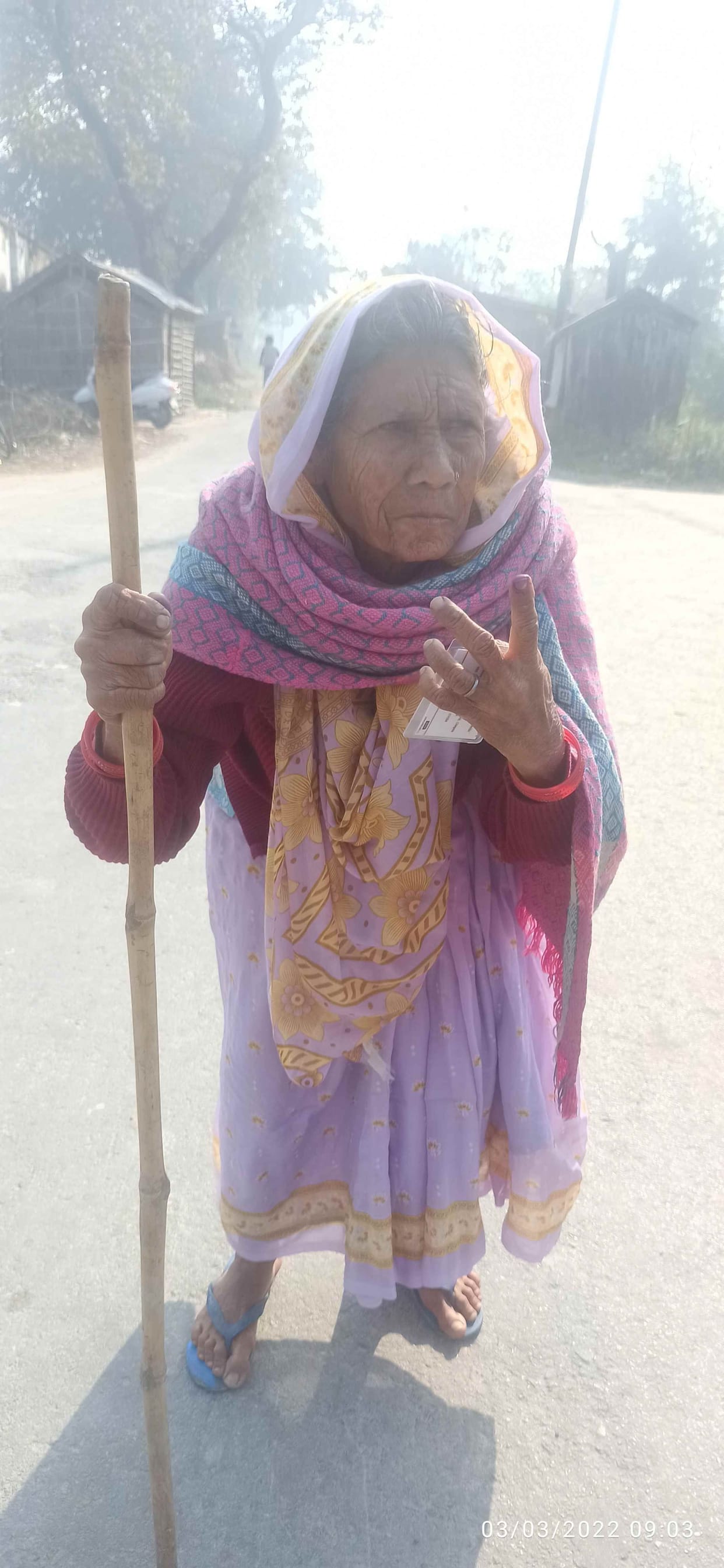 Elders cast their vote with trembling hands