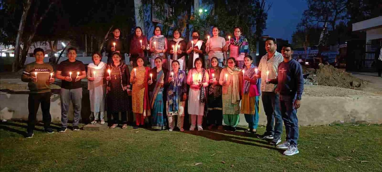 Contracted professors took out candle march for demands