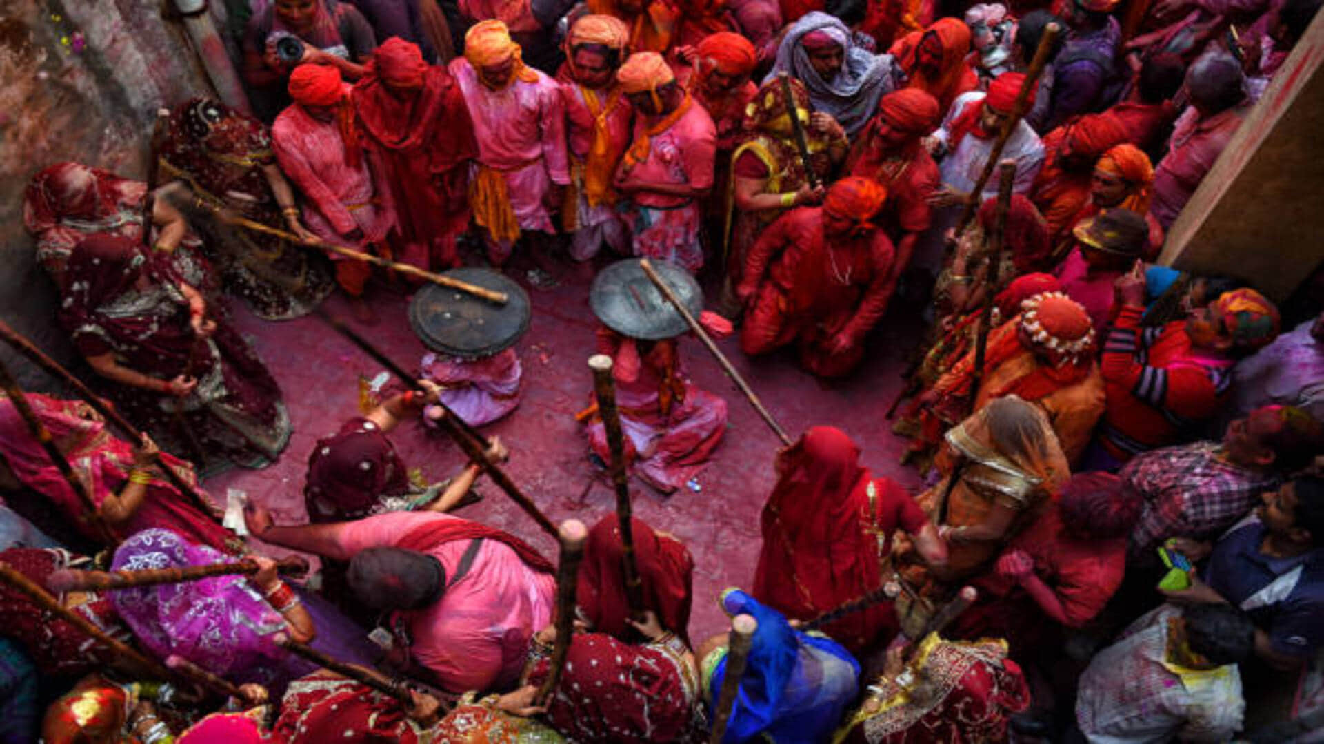 Holi 2024 how lathmar holi started in braj barsana know about weird holi traditions