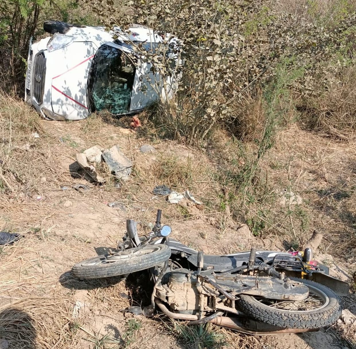 Four injured, three referred in car-bike collision