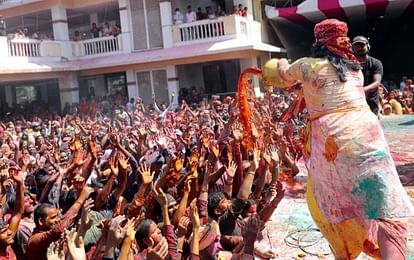 Tesu color showered from hydraulic sprinkler in Priyakantju temple in vrindanan mathura