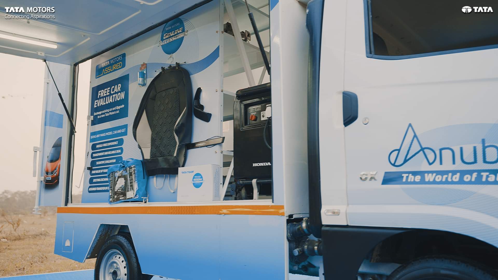 Tata Motors launches mobile car showrooms for door step car buying experience in rural India passenger vehicles of tata motors rural area car sales passenger cars of tata motors