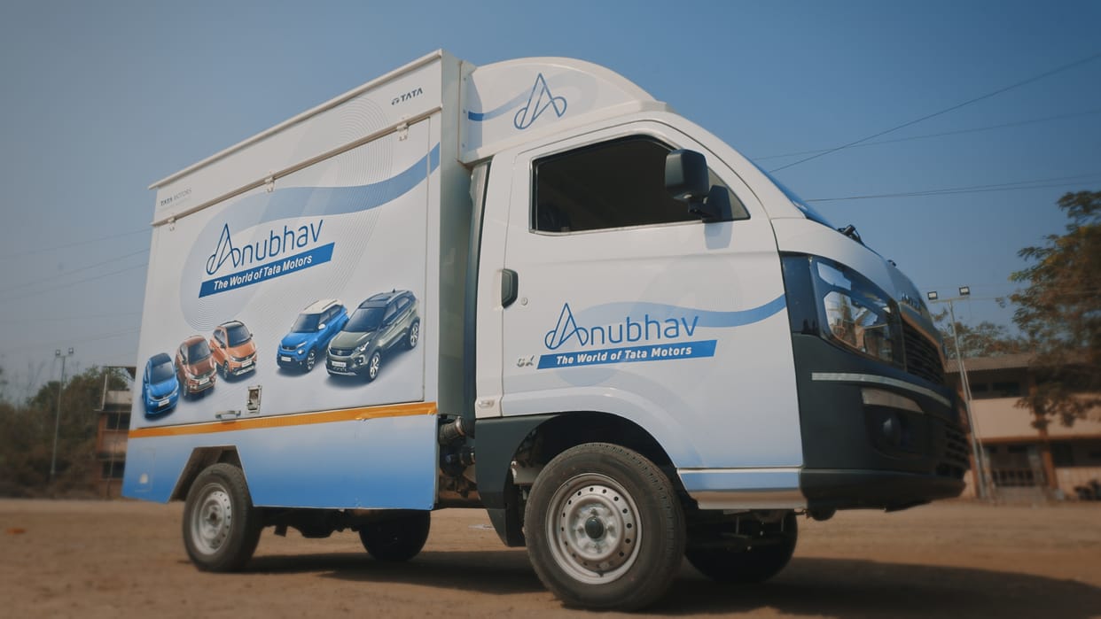 Tata Motors launches mobile car showrooms for door step car buying experience in rural India passenger vehicles of tata motors rural area car sales passenger cars of tata motors