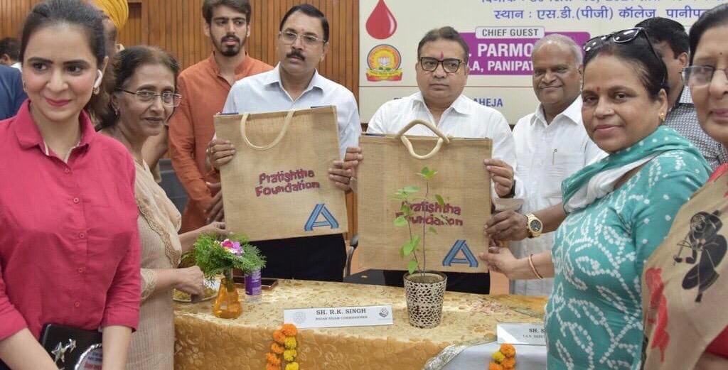 30 thousand bags made from waste plastic, distributing it to people