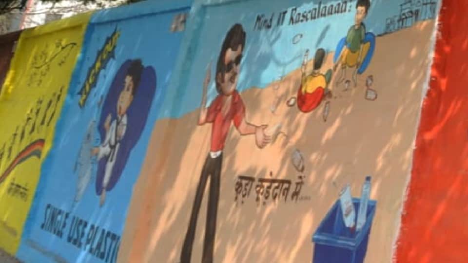 painting of Gabbar and film actors on walls making people aware about cleanliness in agra