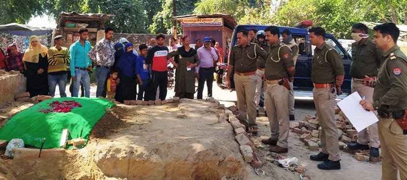 Daughter protested over tampering with father's grave