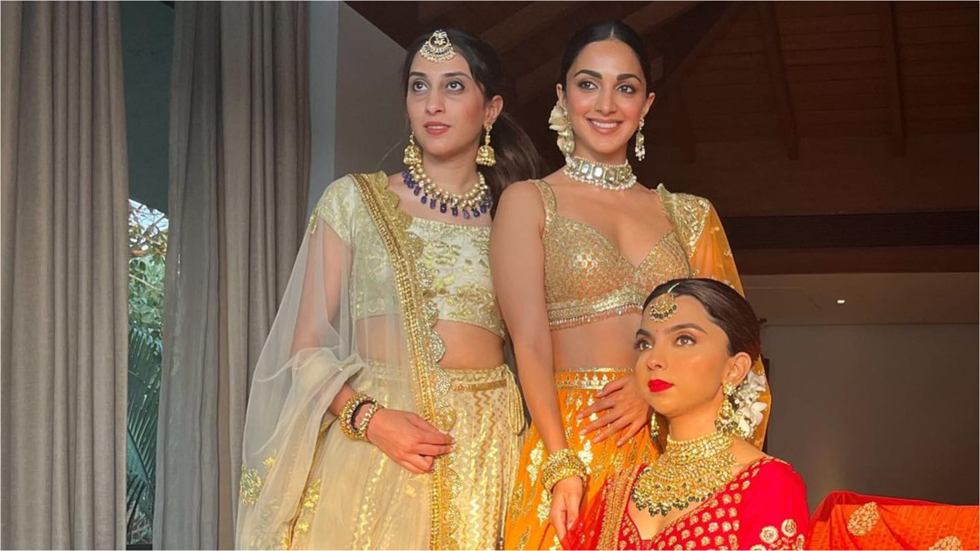 kiara advani in sister wedding wearing golden bralette blouse with orange lehenga