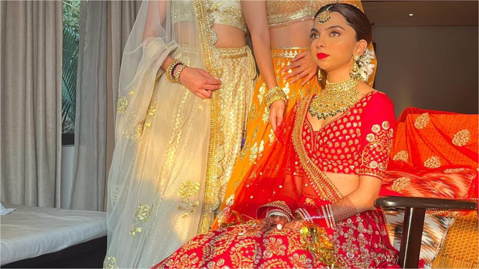 kiara advani in sister wedding wearing golden bralette blouse with orange lehenga