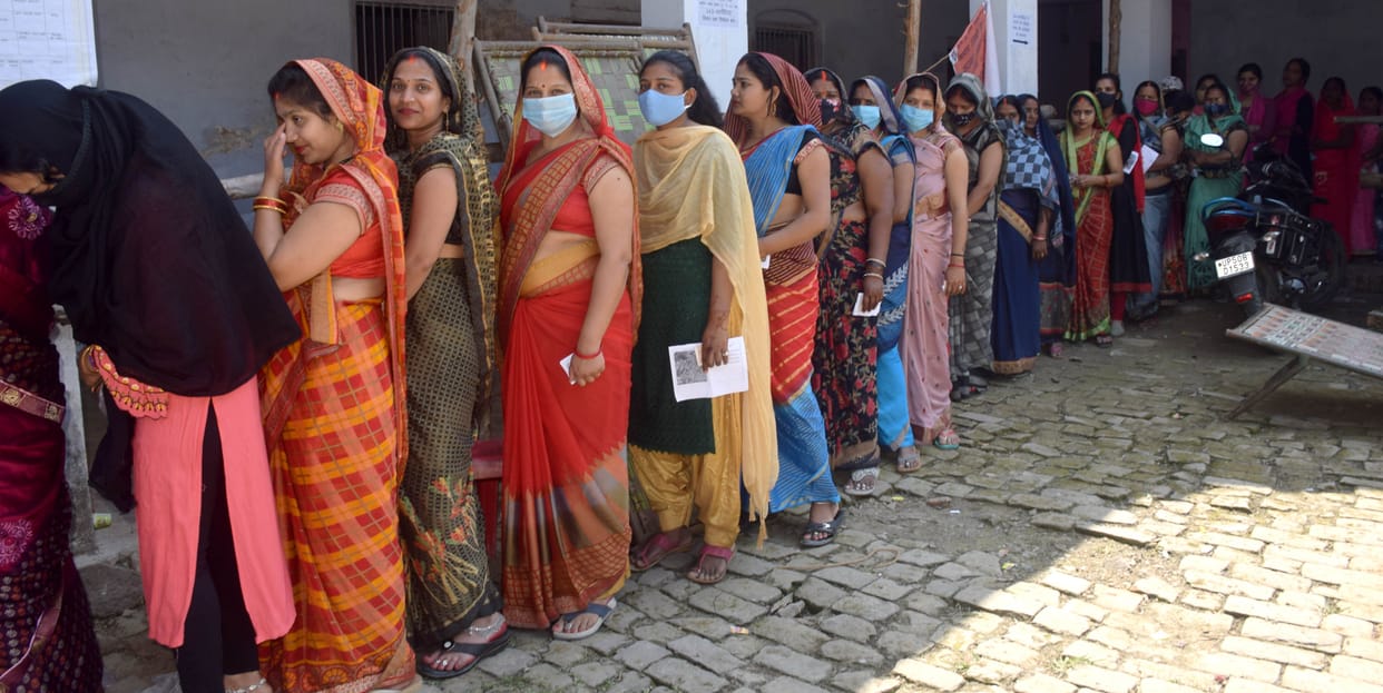 Leaving the stove, the women came to vote with the child in their arms
