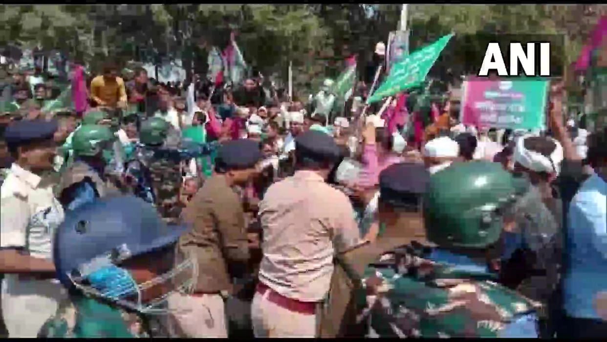 Police use water cannons to disperse the workers of Jan Adhikar Party