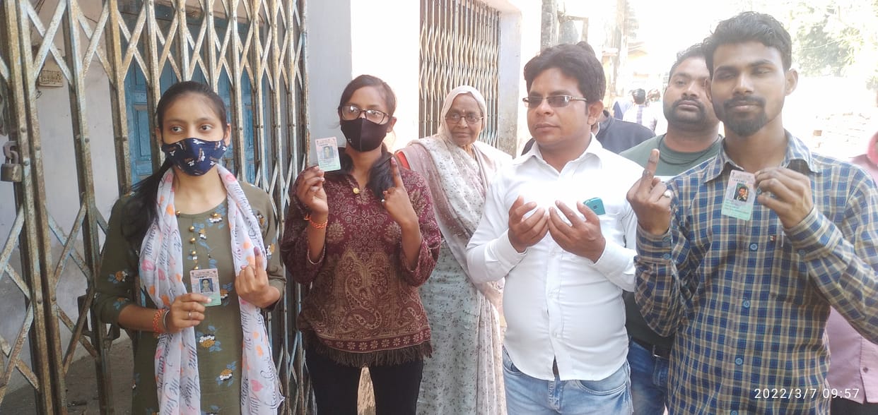 Youth cast votes, posted with selfie