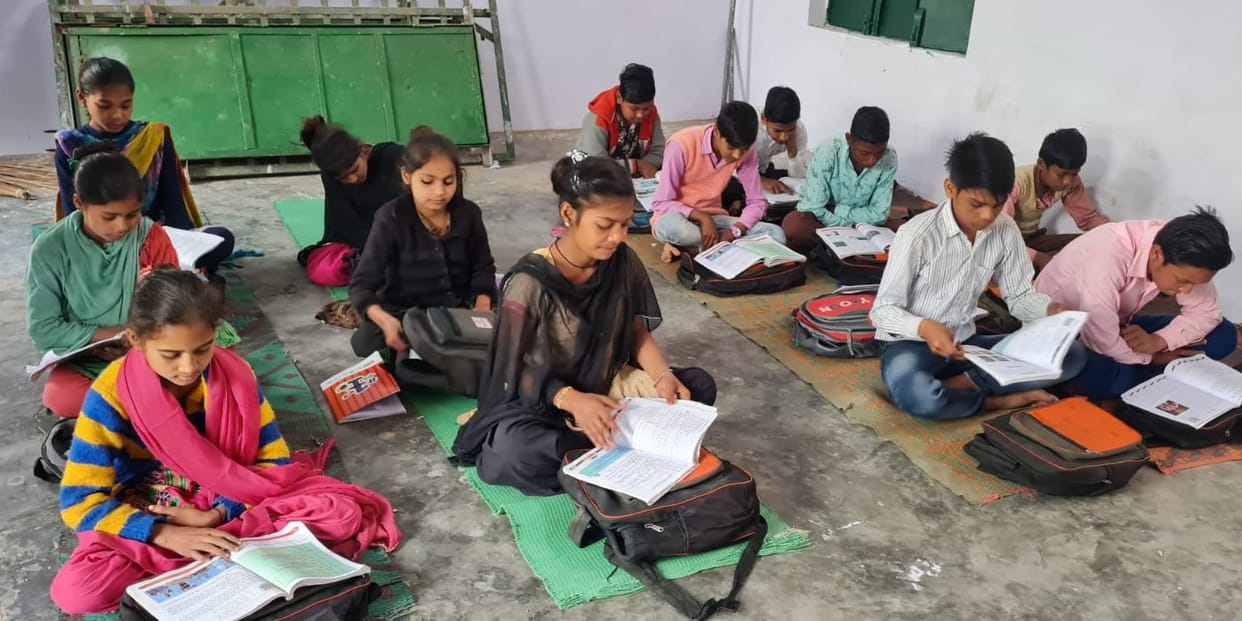 308 junior high school children of the district are waiting to sit on the bench and study