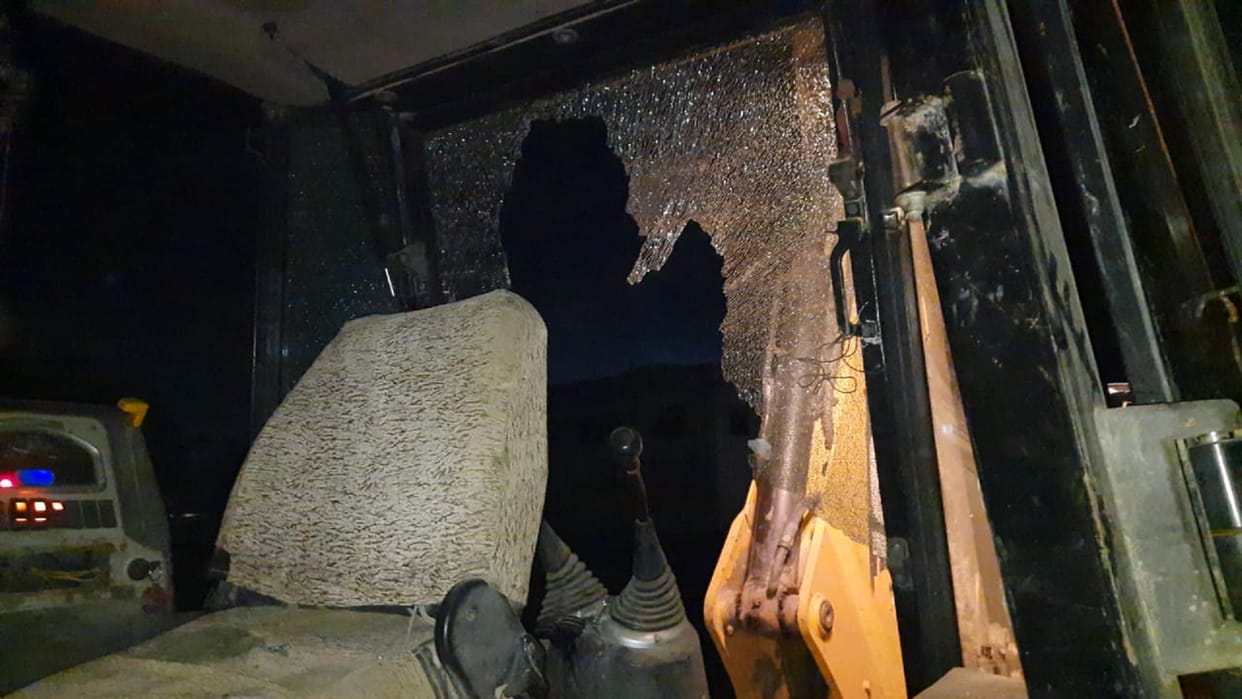 Bulldozers involved in BJP's victory procession were pelted with stones, glass broken