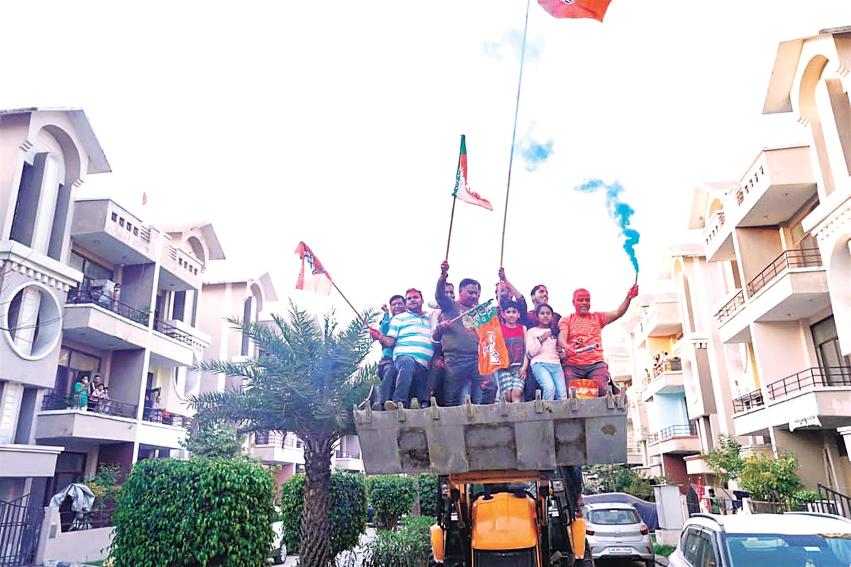 BJP celebrates on bulldozer