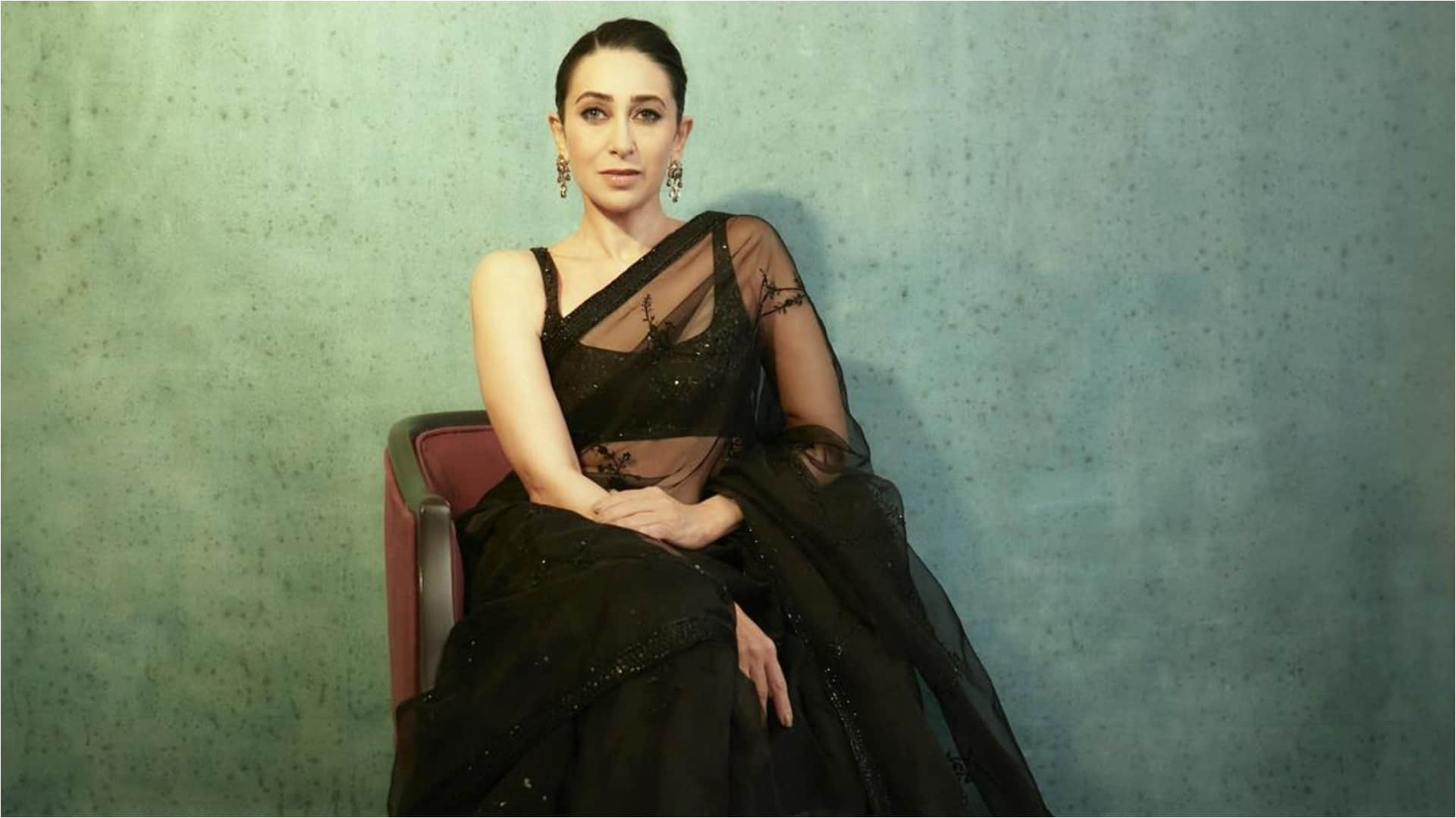 karisma kapoor stunning look in sheer black saree from sabysachi