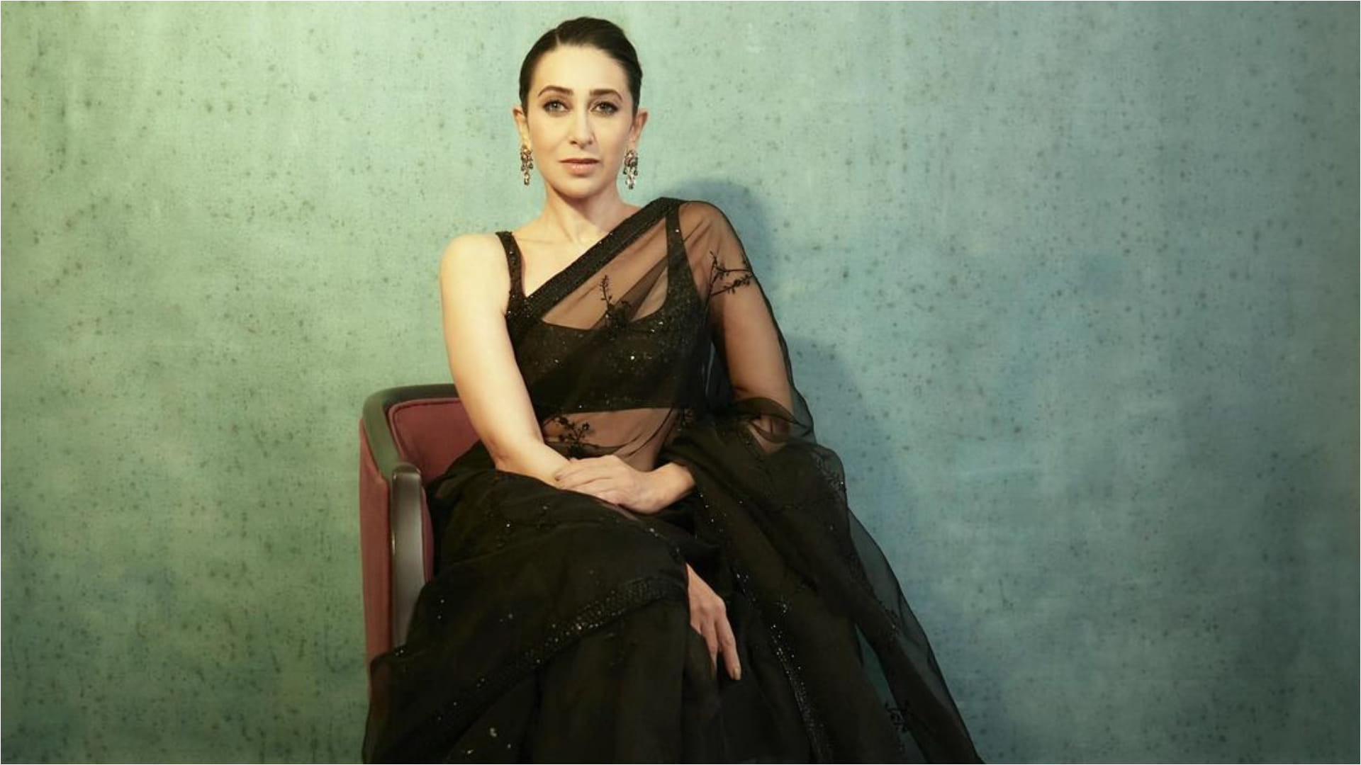 karisma kapoor stunning look in sheer black saree from sabysachi