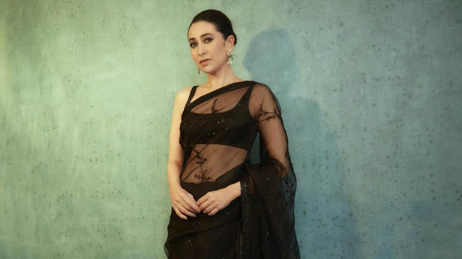 karisma kapoor stunning look in sheer black saree from sabysachi