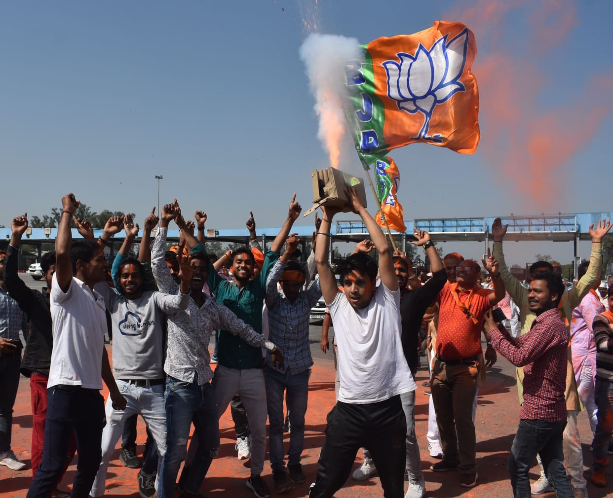 Saffron colored gulal on BJP's victory
