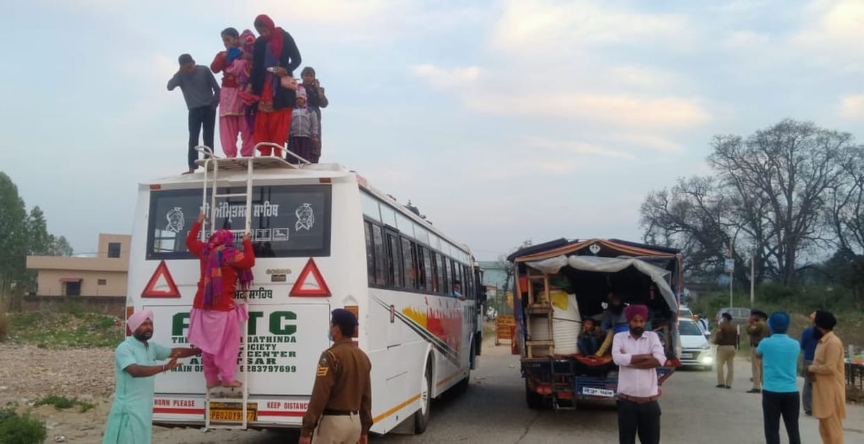 Devotees going on goods vehicles for Maidi landed