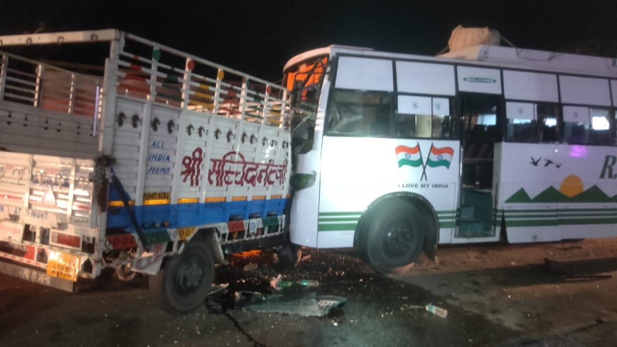 Traumatic death of two in direct collision of bus and canter