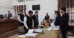 राष्ट्रीय लोक अदालत में विभिन्न केसों का निपटारा करते न्यायाधीश। संवाद
