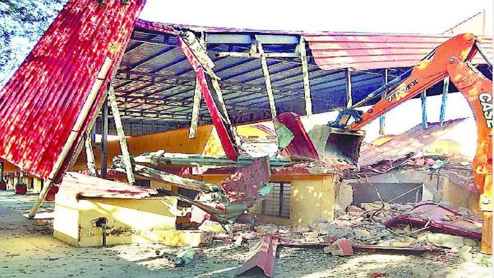 bulldozer demolishes st anthony girls school illegal constructions in agra