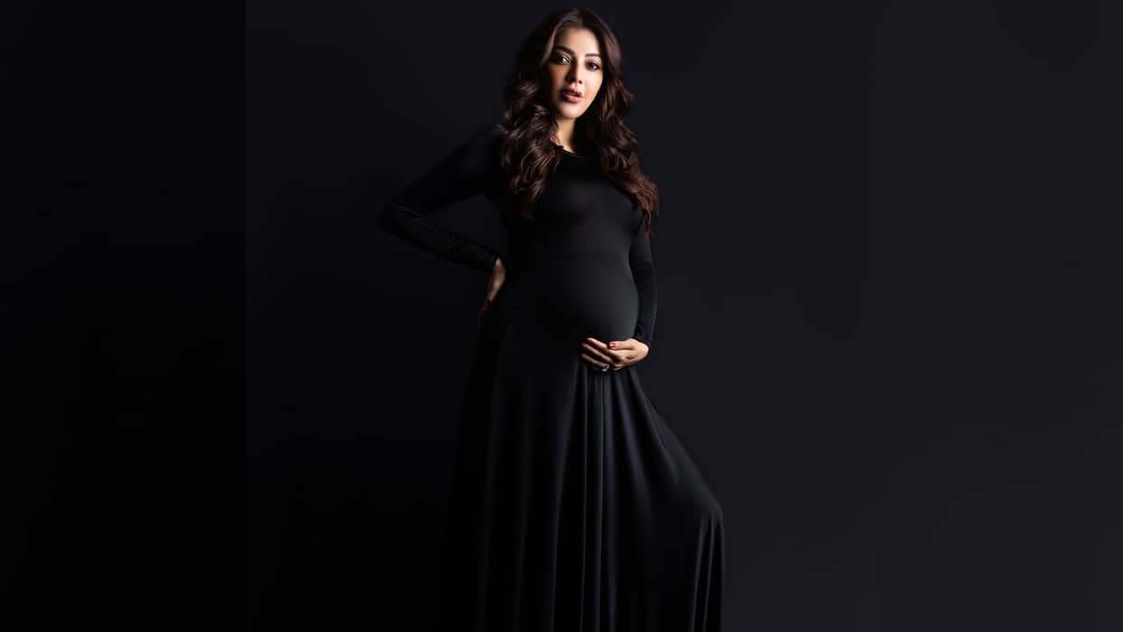 kajal aggrawal posses in black dress for maternity photoshoot see actress new pics