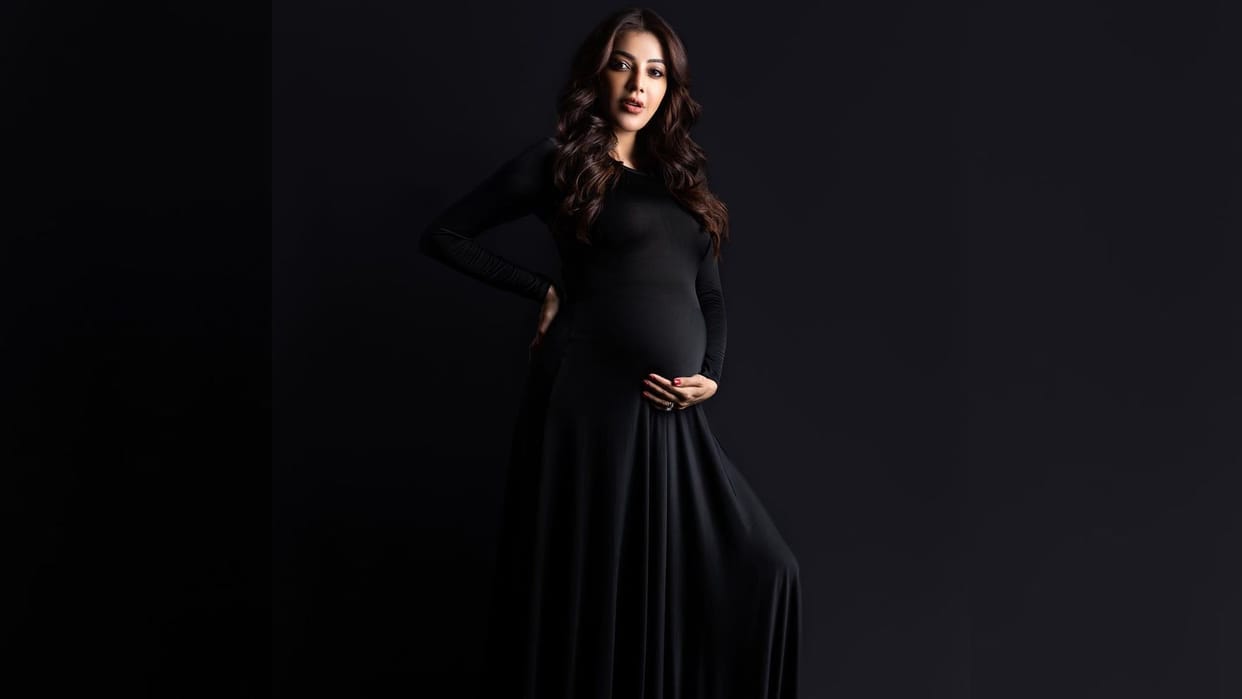 kajal aggrawal posses in black dress for maternity photoshoot see actress new pics