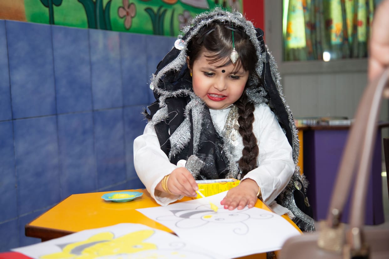 Masti fair painted in the colors of Falgun