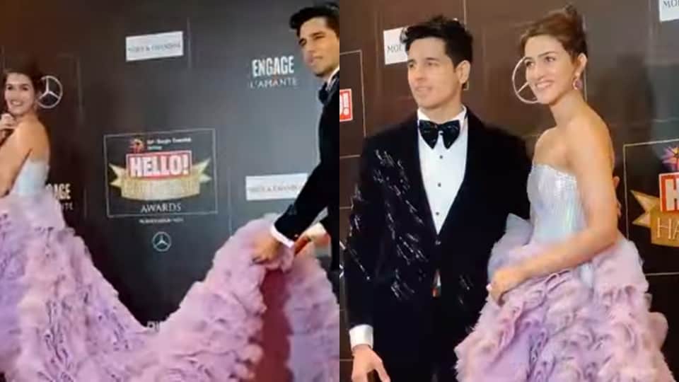 sidharth malhotra lifts kriti sanon heavy gown fans give funny reaction