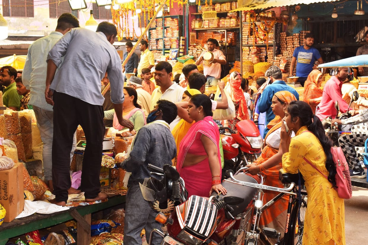 Customers gathered in the market for shopping on the festival of Holi
