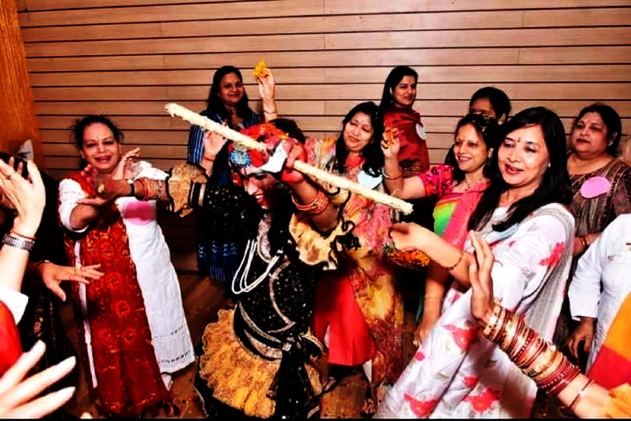 Played Holi of flowers, shared happiness by giving gifts to girls
