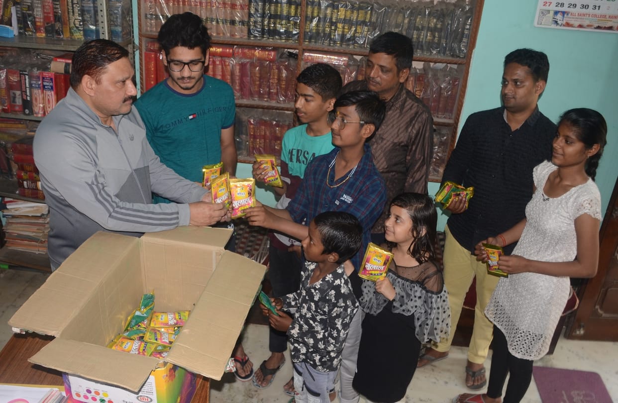 The faces of people blossomed after receiving gulal