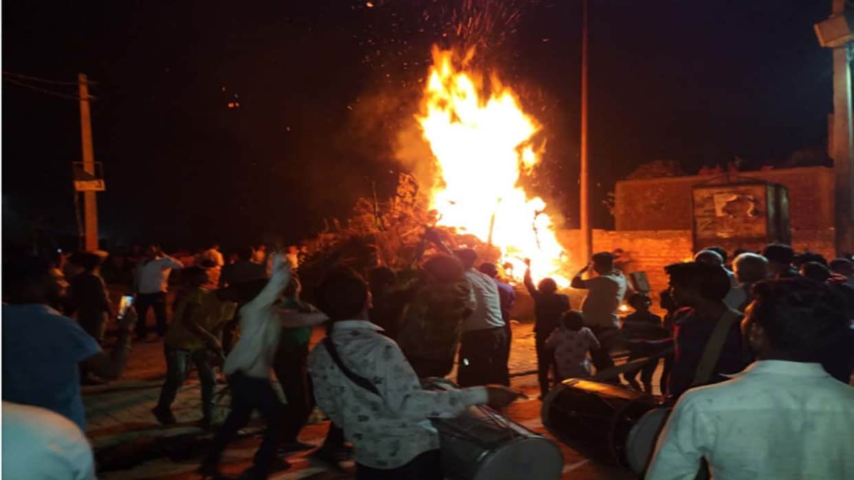 Muzaffarnagar: Holika Dahan on the beats of the drum after day long worship amid tight police security