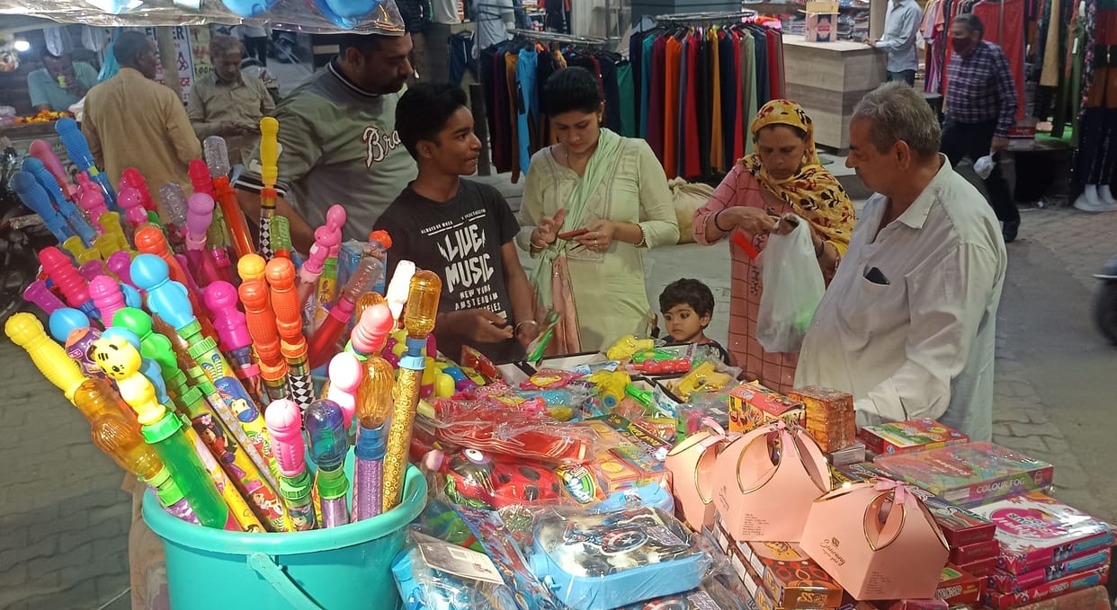 Holi celebration in the market, the market is full of gulal