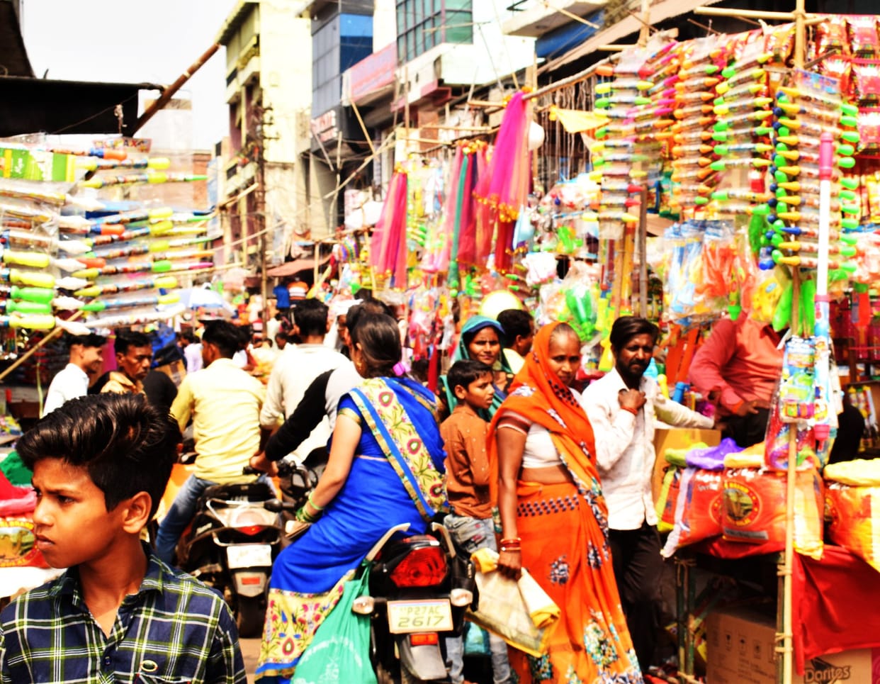 On the day of weekly closure, customers gathered in the markets for the purchase of Holi