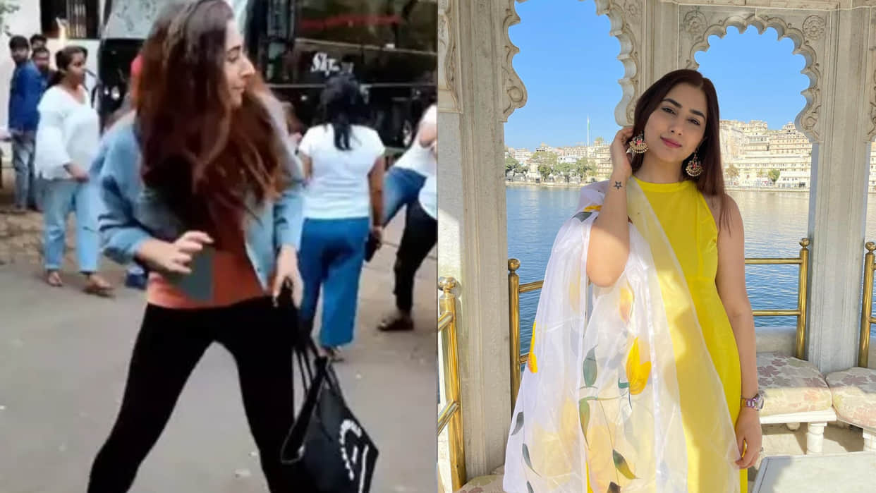Disha Parmar got scared from the people playing holi as she is posing for paparazzi