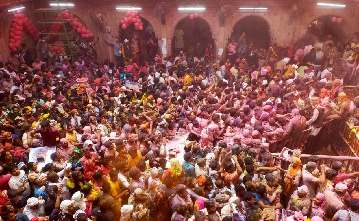 Mathura: Adorable Thakur Banke Bihari, sitting as a king in a pink dress