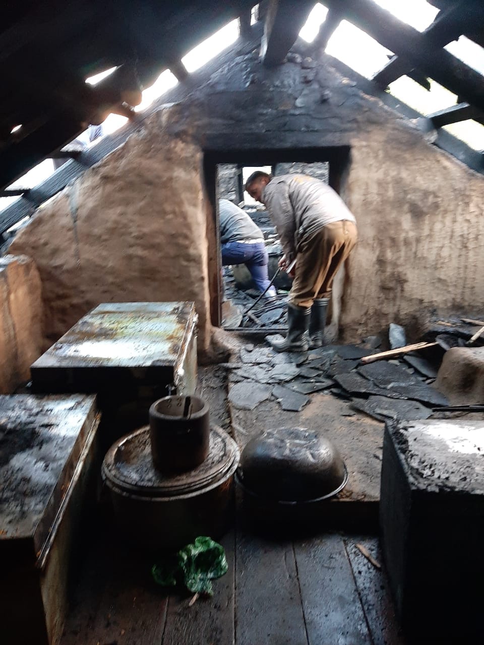 One and a half storey slate posh house burnt