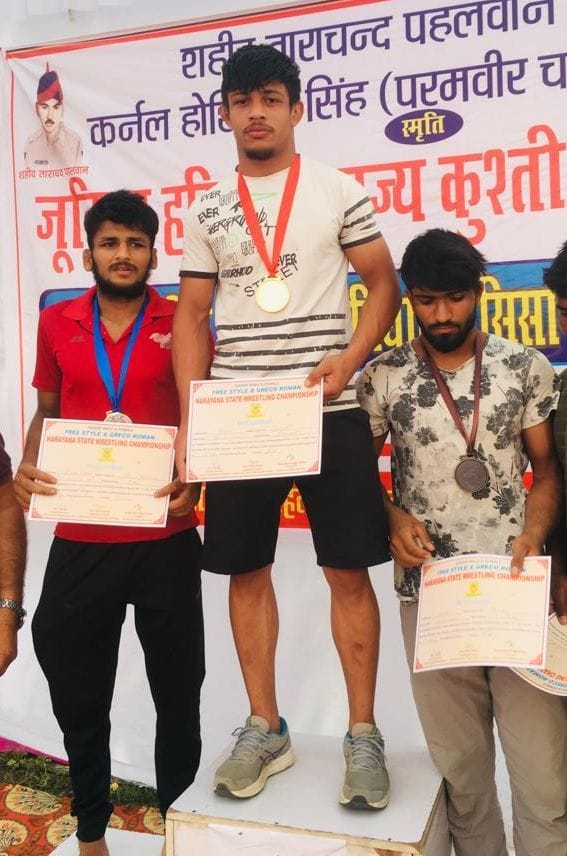 Dada started playing watching Tau playing wrestling, Ankit won gold in state level competition