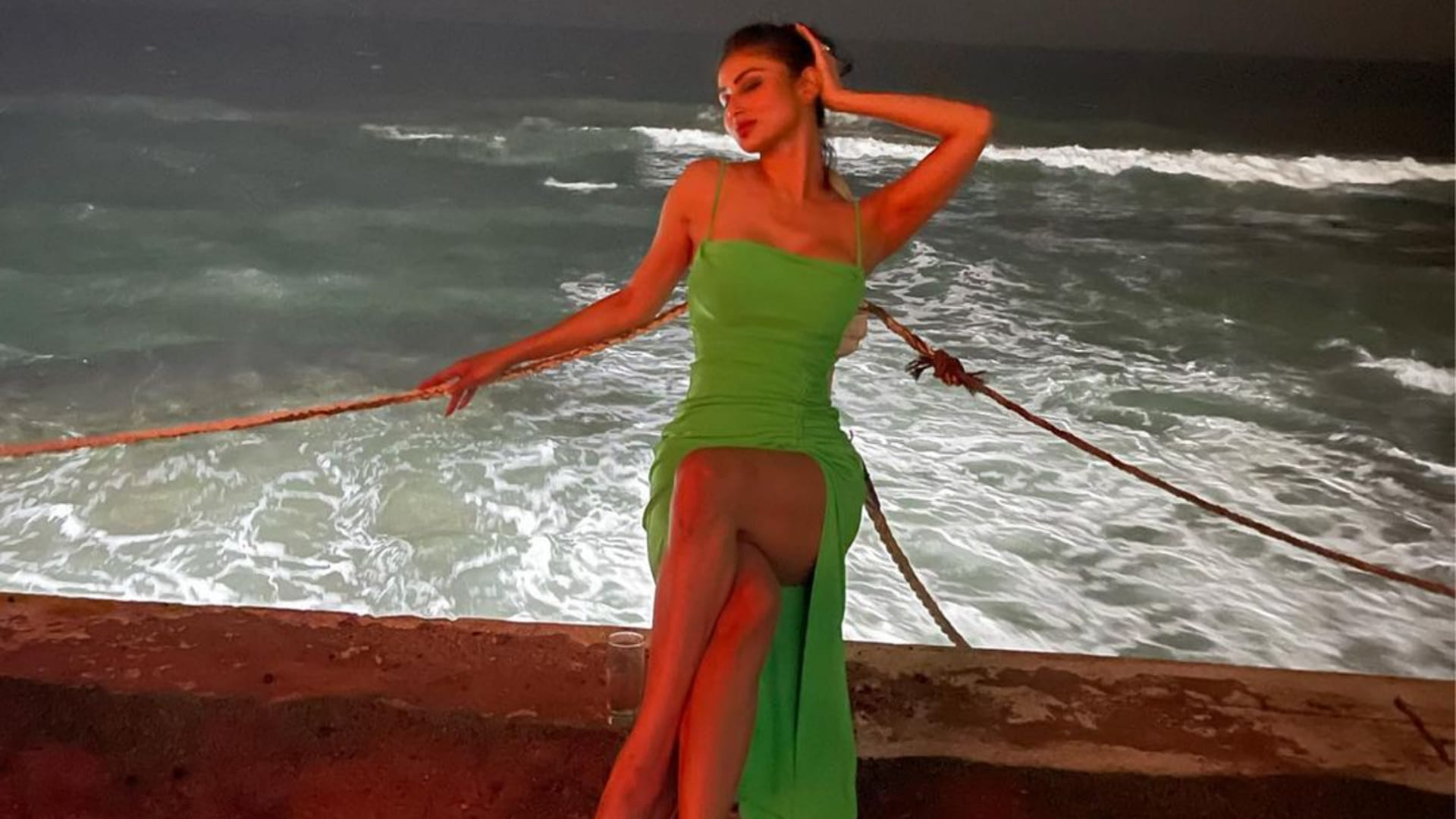 fashion faceoff shanaya kapoor mouni roy wears green thigh high slit dress look sizzling
