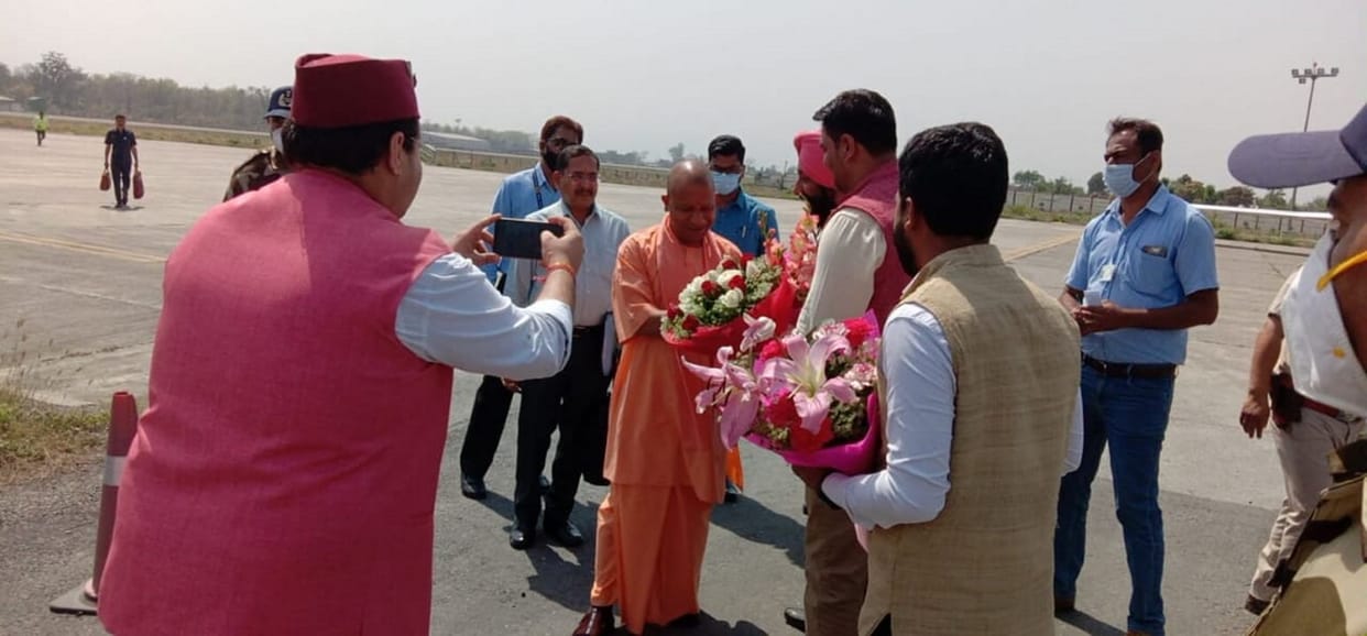 Slogans of bulldozer baba raised in support of UP CM Yogi Adityanath at Dhami swearing in ceremony