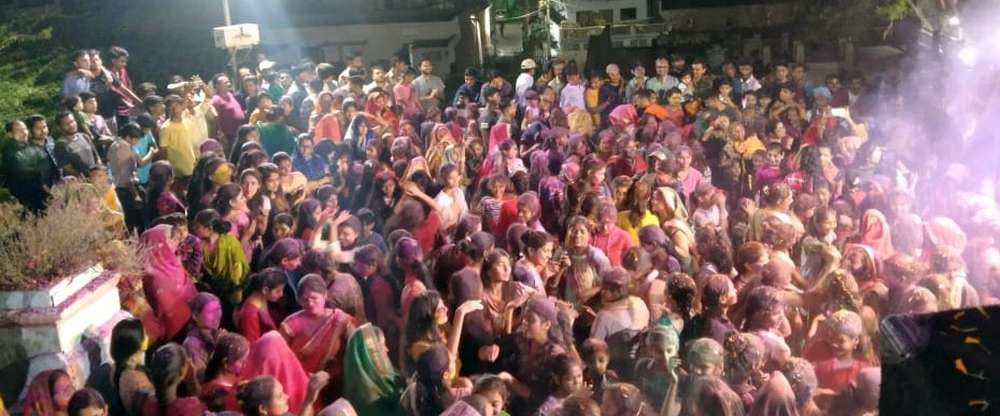 Women played Holi of colors and flowers